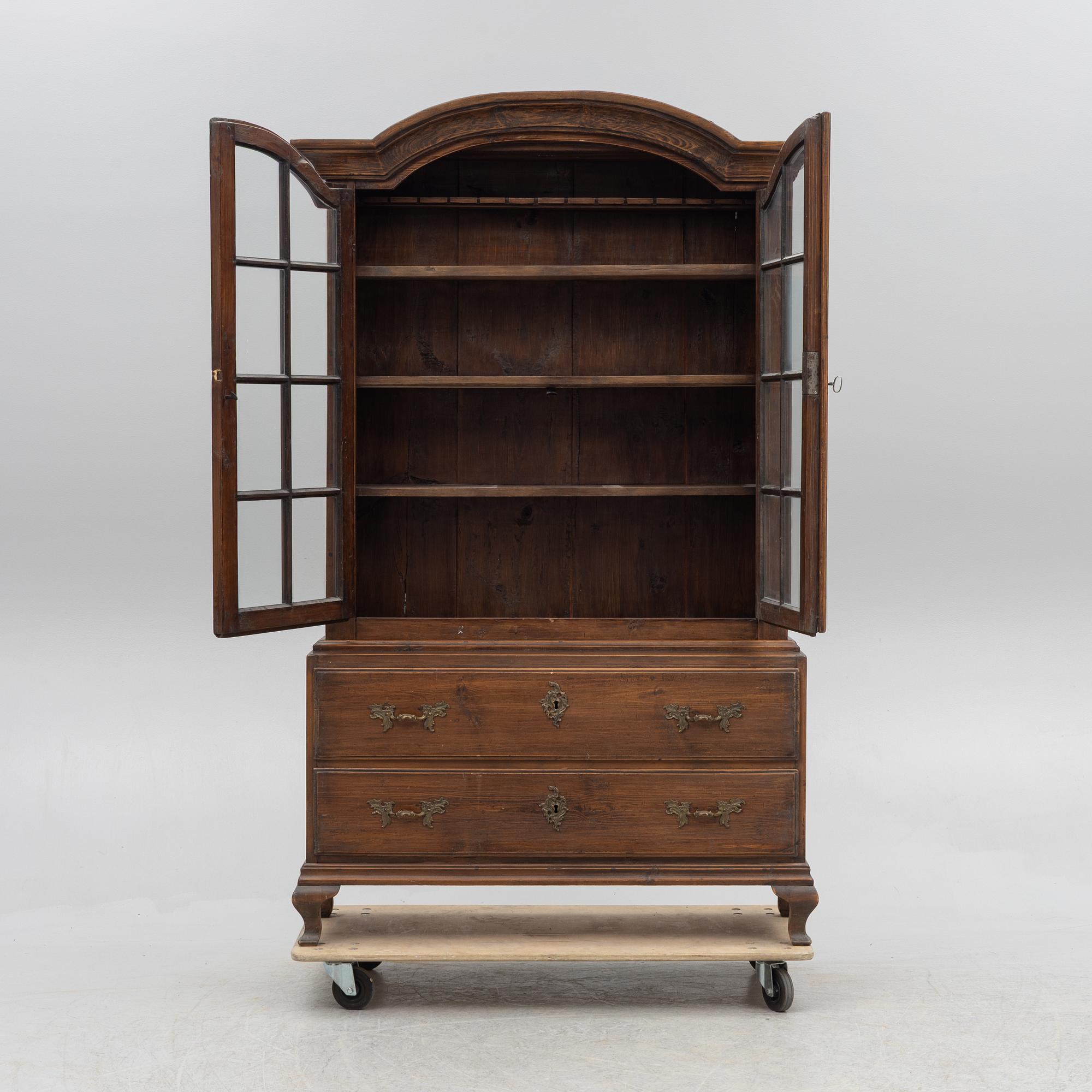 A display cabinet, 18th Century.