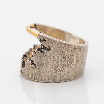 A Tobias Wistisen silver and gold ring.