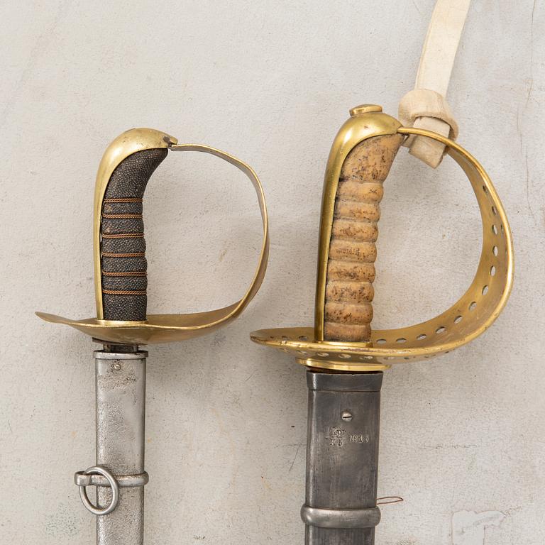 Two Swedish Swords, of which one m/1893 for the cavalry, with scabbard.