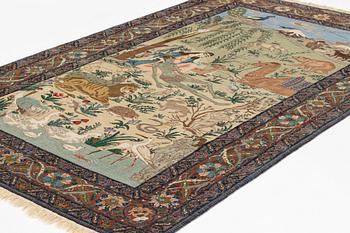 A carpet, semi-antique, Tabriz, signed, ca 271 x 175 cm.