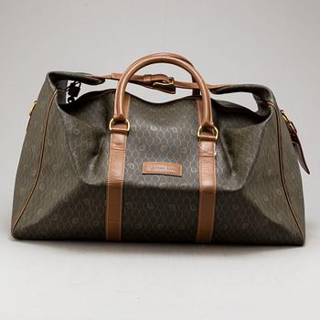 CHRISTIAN DIOR, a canvas and leather weekendbag.