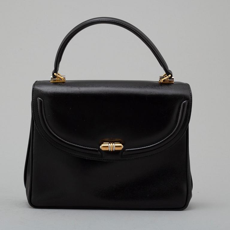 GUCCI, black leather bag.