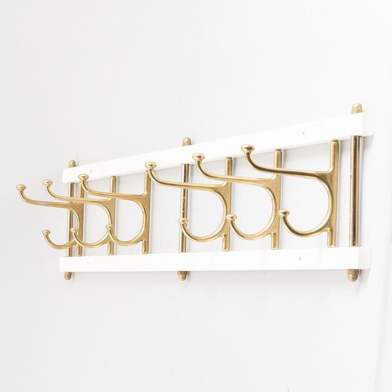 Klädhängare, "Dekorativ", Skoglunds metallgjuteri, Anderstorp, 1900-talets mitt.