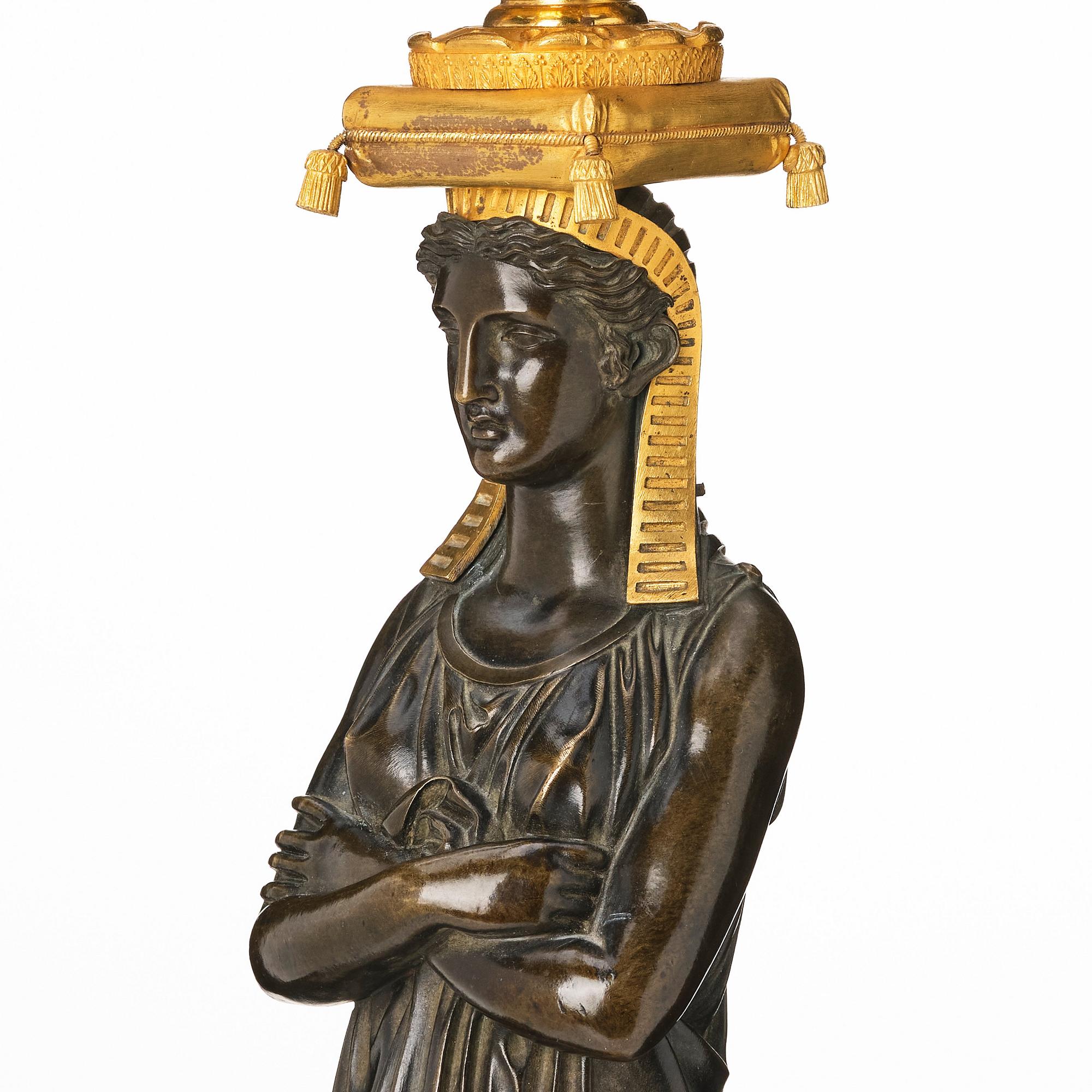 A pair of important six light Retour d`Egypt Empire candelabra.