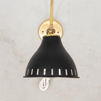 A bras wall lamp later part of the 20th century.