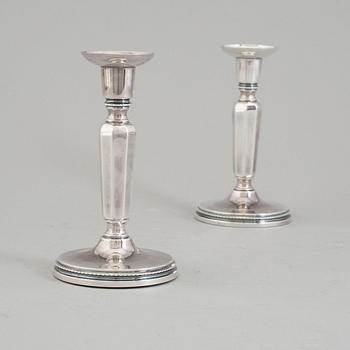 A pair of 1971 silver candelsticks by MGAB, Uppsala.