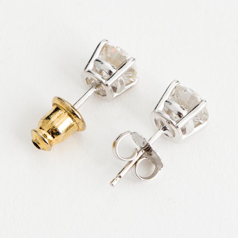 DIAMOND STUDS, 14K white gold with 2 diamonds approx. 1.40 cts.