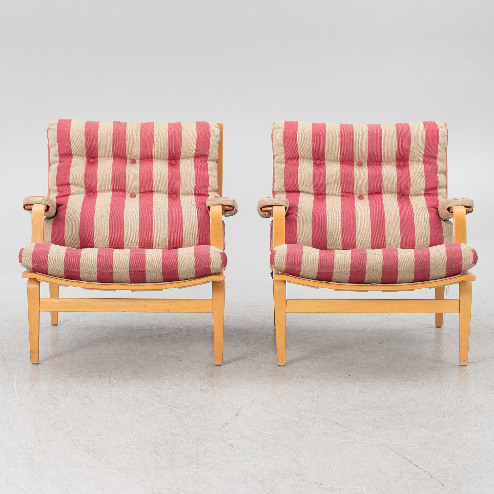 Bruno Mathsson, a pair of "Ingrid" armchairs, Dux, Sweden, second half of the 20th century.