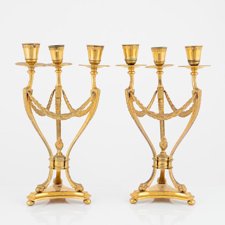 A pair of gilt candelabra, GAB, Stockholm, around the year 1900.