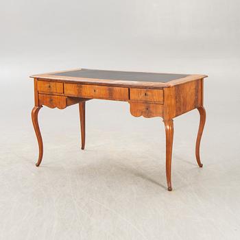 A Neo Rococo walnut desk later part of the 20th century.