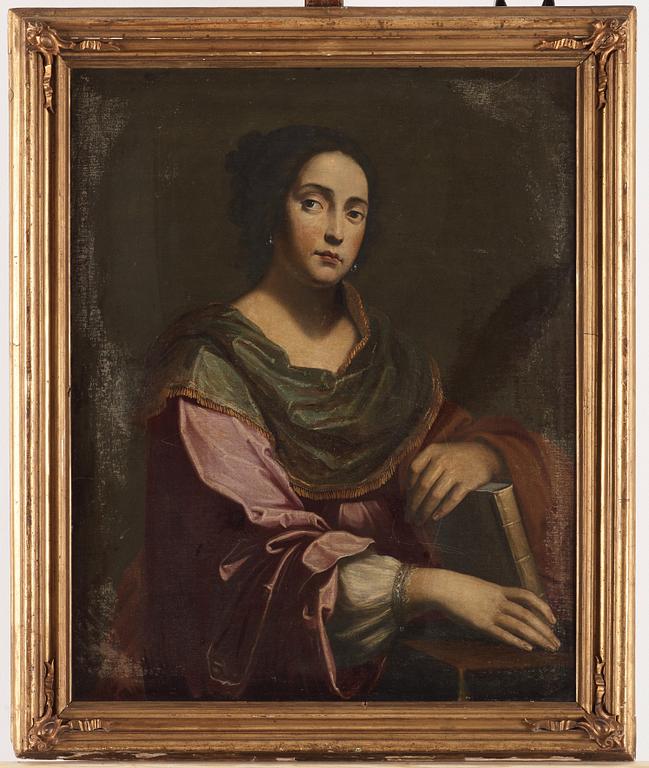 Giulio Cesare Procaccini In the manner of the artist, A lady with pearl earrings and holding a book.