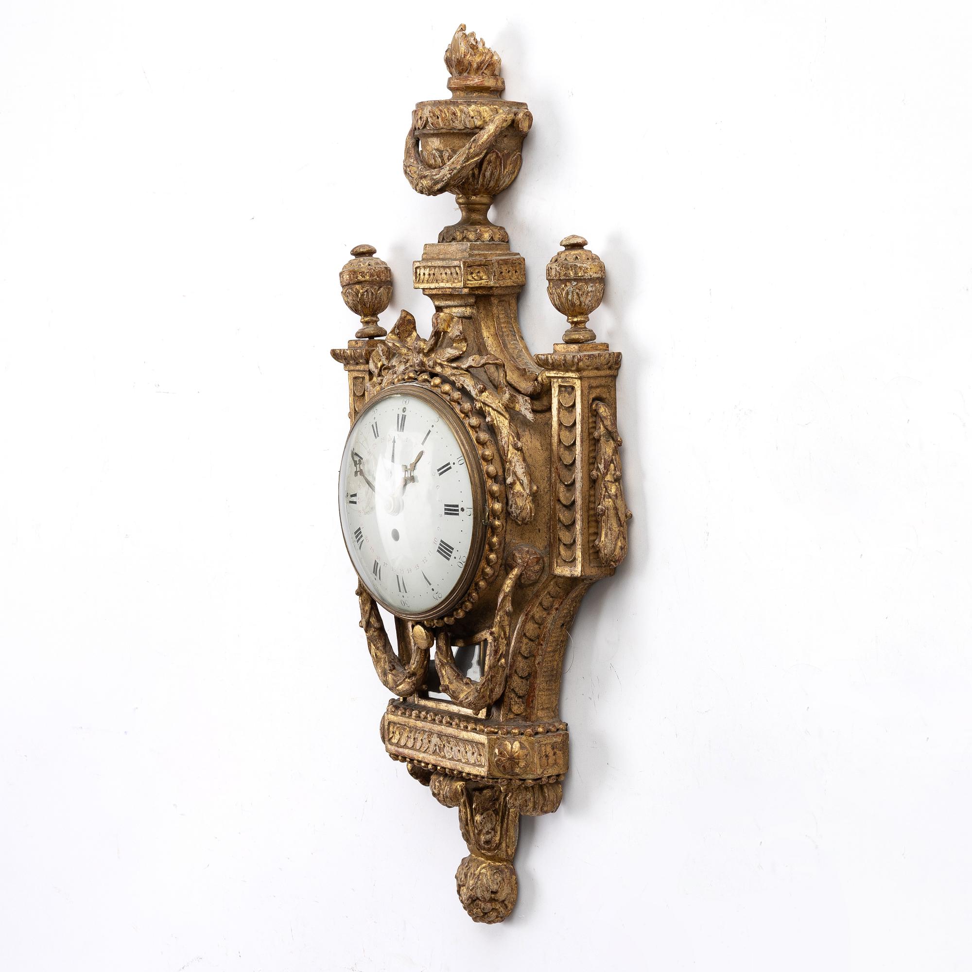An Austrian Louis XVI giltwood cartel clock by J. Bentele (watchmaker in Salzburg ca 1780).