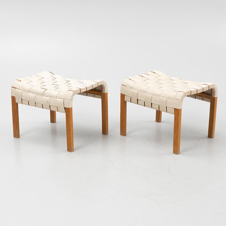 Yngve Ekström, a pair of "Primo" armchairs with ottomans, Swedese, Sweden,