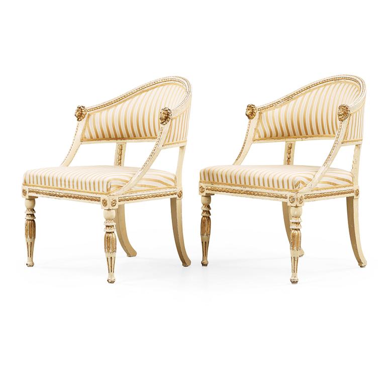 A pair of late Gustavian early 19th century armchairs.