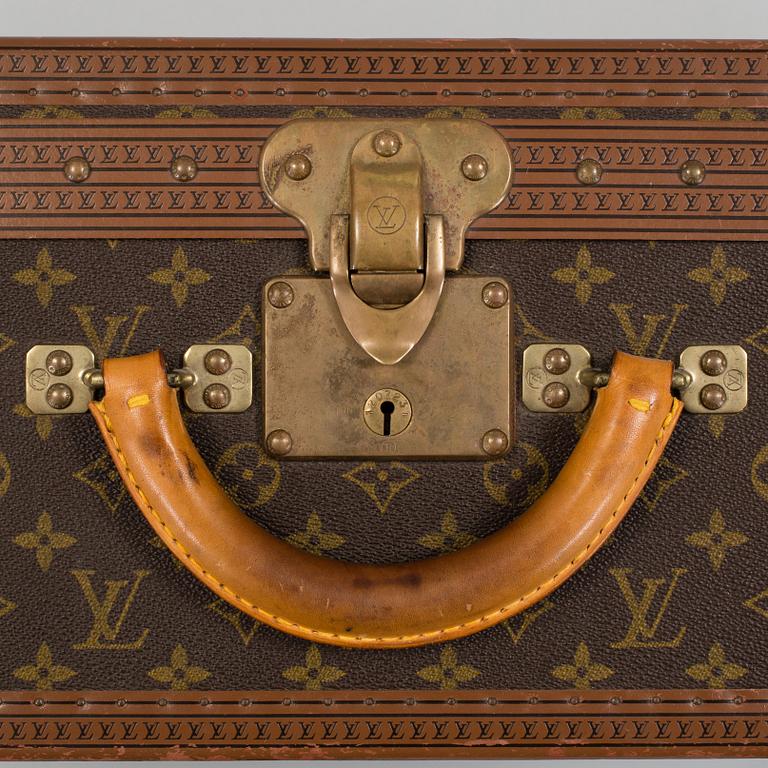 LOUIS VUITTON, a monogram canvas suitcase.