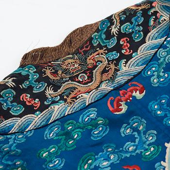 A Chinese embrodiered coat, late Qing dynasty, circa 1900.