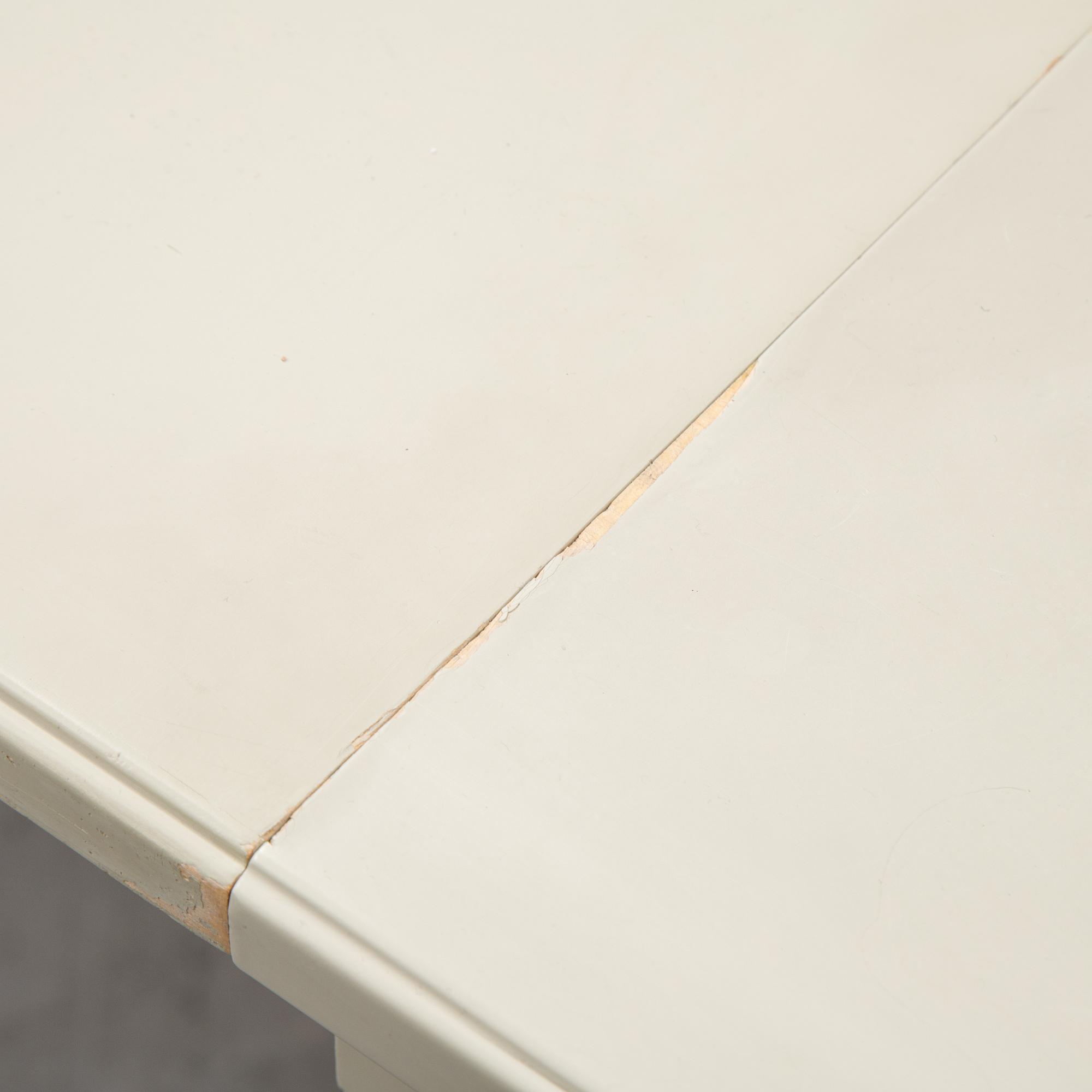 A dining table and six chairs by Carl Malmsten for Bodafors.