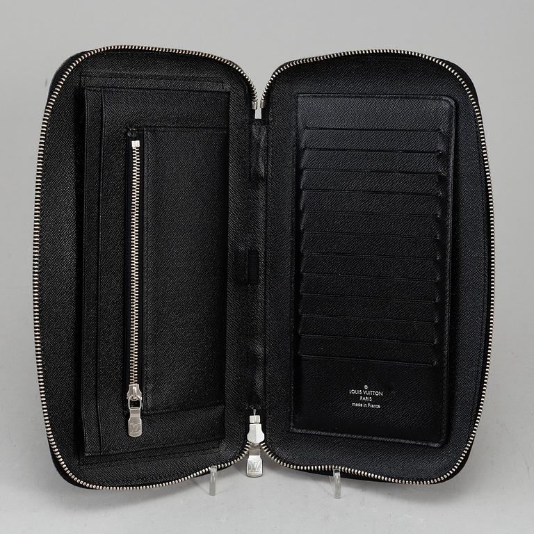 LOUIS VUITTON, an 'Atoll Ardiose' Taiga leather trave organizer, 2015.