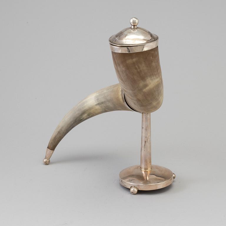 A drinking horn with silver mounts dated 1948.