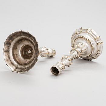 A pair of mid 18th century brass, argent haché, candlesticks, France.