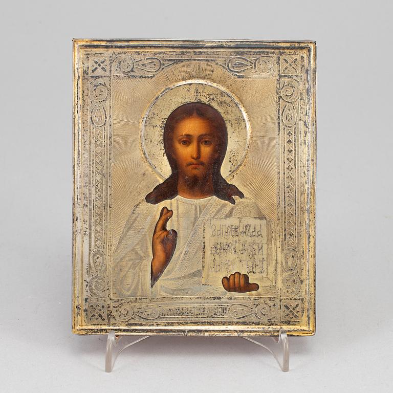 A Russian silver-gilt icon, unidentified makers mark, Moscow 1889.