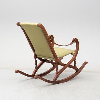 a late 19th century rocking chair.
