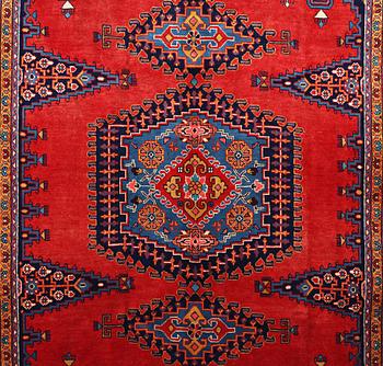 A CARPET, Wiss Signed Sharbani.  327 x 227 cm.
