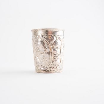 Five Russian 18th century silver and brass beakers, silver weight 292 gr, height ca 7-8,5 cm.