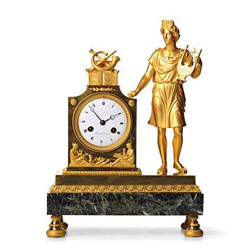 133. A French Empire mantel clock, beginning of the 1800's.