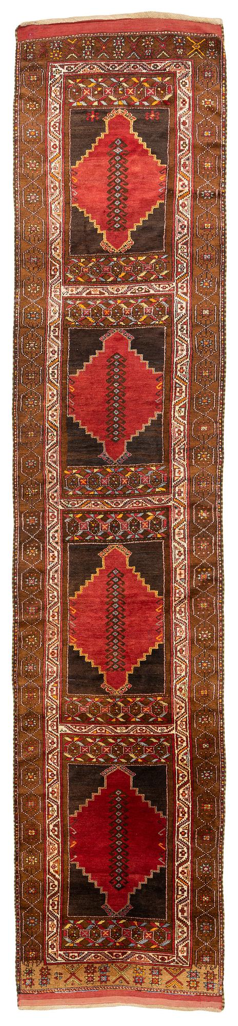 An antique Sivas runner, Ottoman Empire (Turkey), ca 495 x 105 cm (the ends with 9-7.5 cm flat weave on each side).