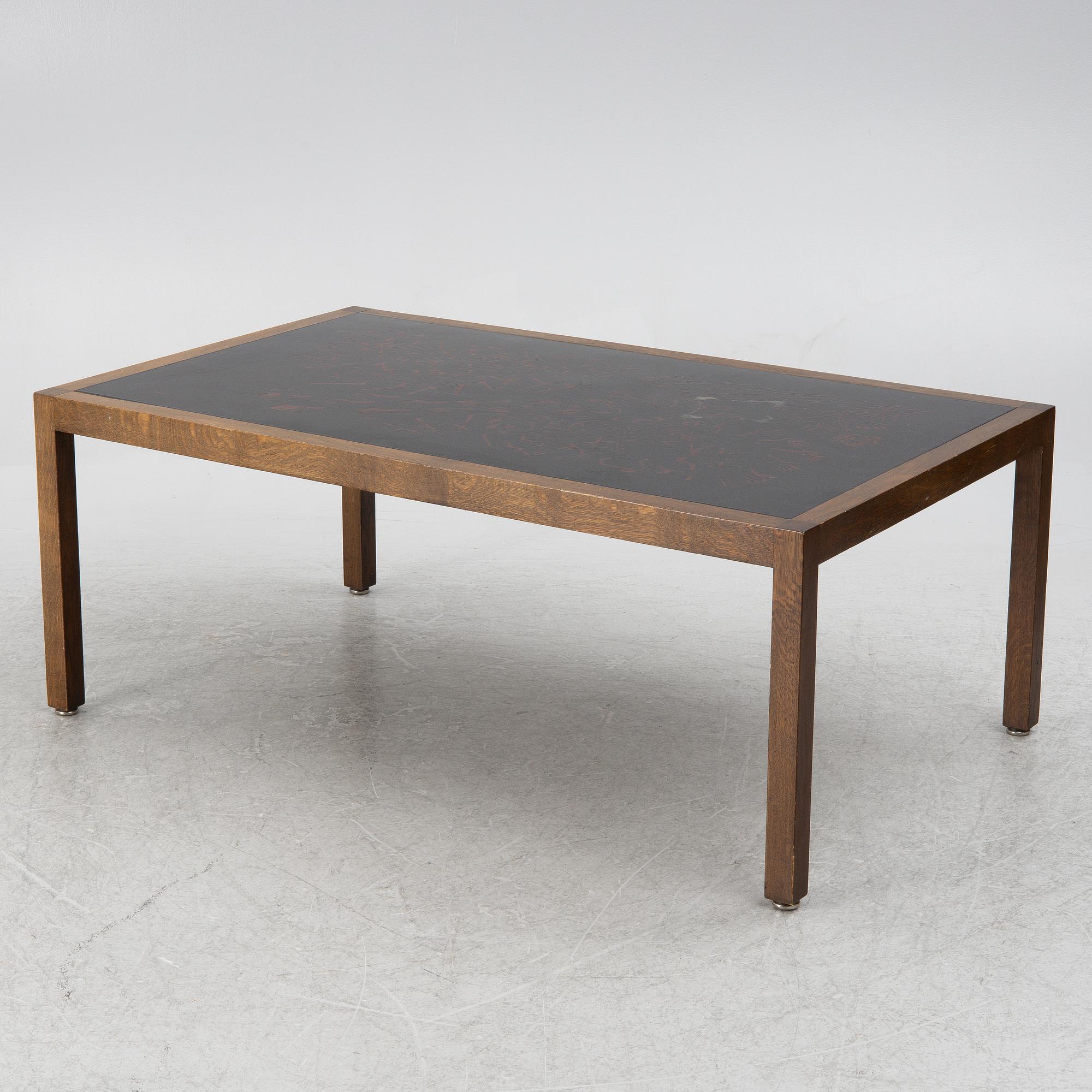 A coffee table with enamel table top by Bror Marklund, Sweden, 1970's.