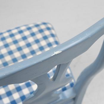 A five-piece Rococo style dining suite, circa 1900.