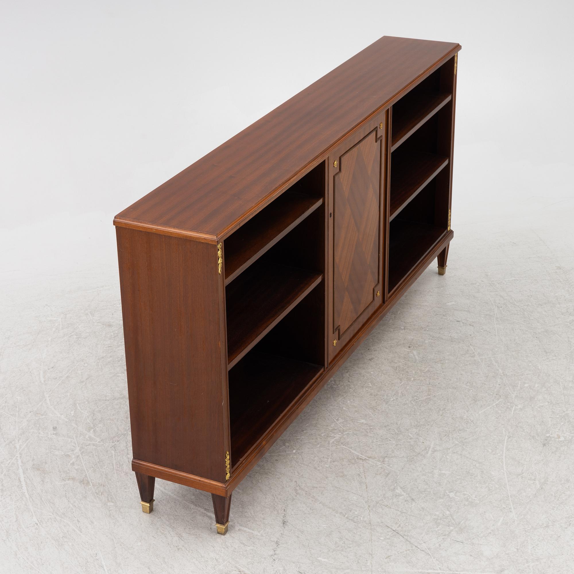 A bookcase, mid 20th century.