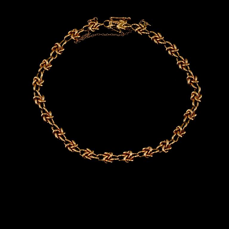 ARMLÄNK, 18k guld, importstämplad. Vikt 13 g.