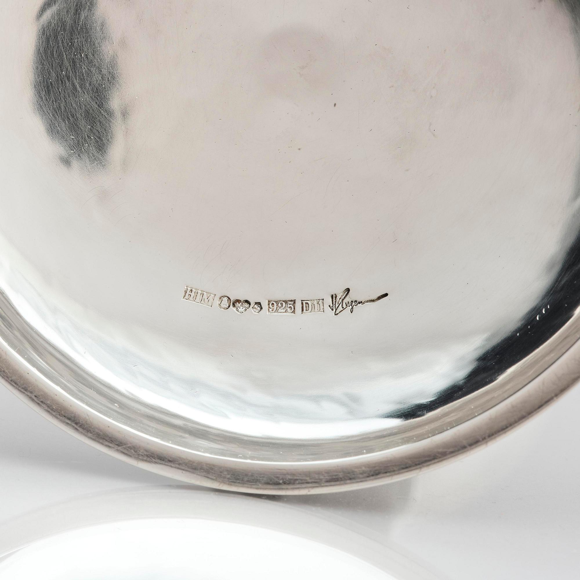 Henrik Ingemansson, a pair of sterling silver and Älvdal porphyry candelsticks, Ingemansson's Smithy, Stockholm, 2002.