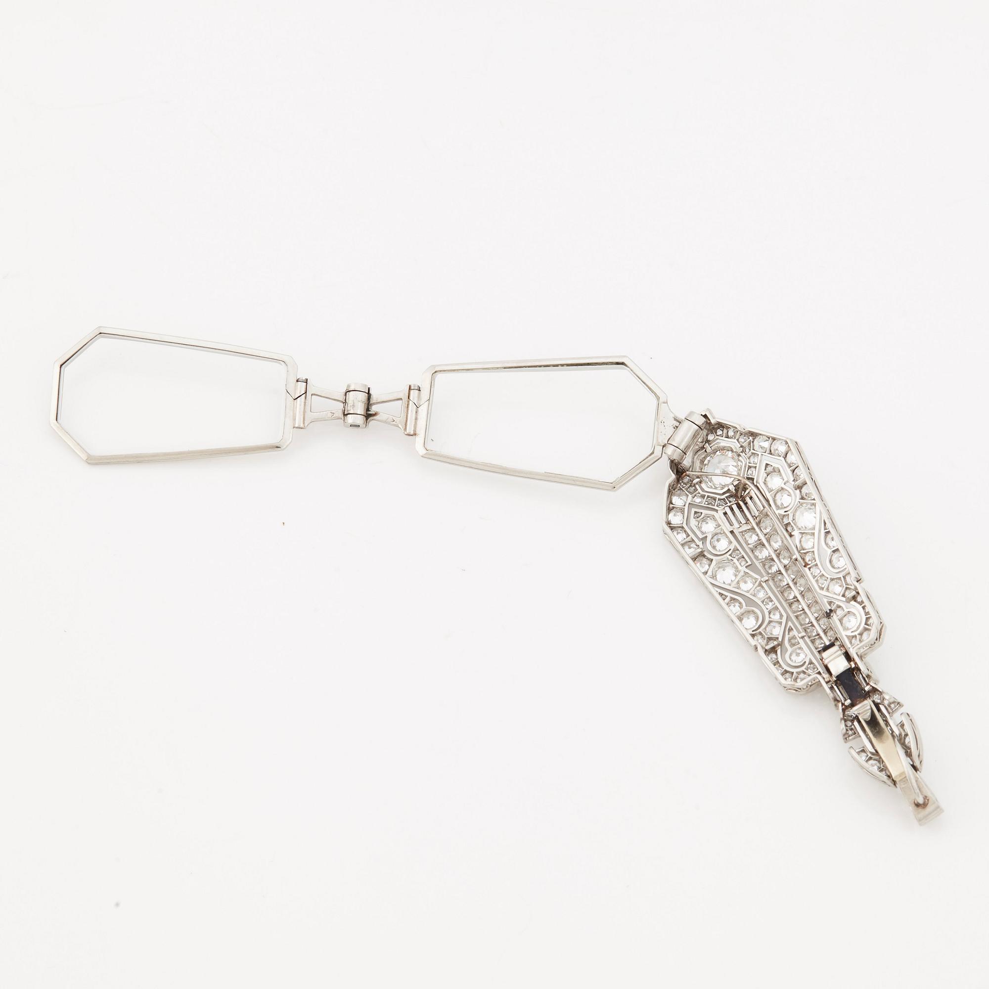 A pair of lorgnettes set with old- single- and baguette cut diamonds.