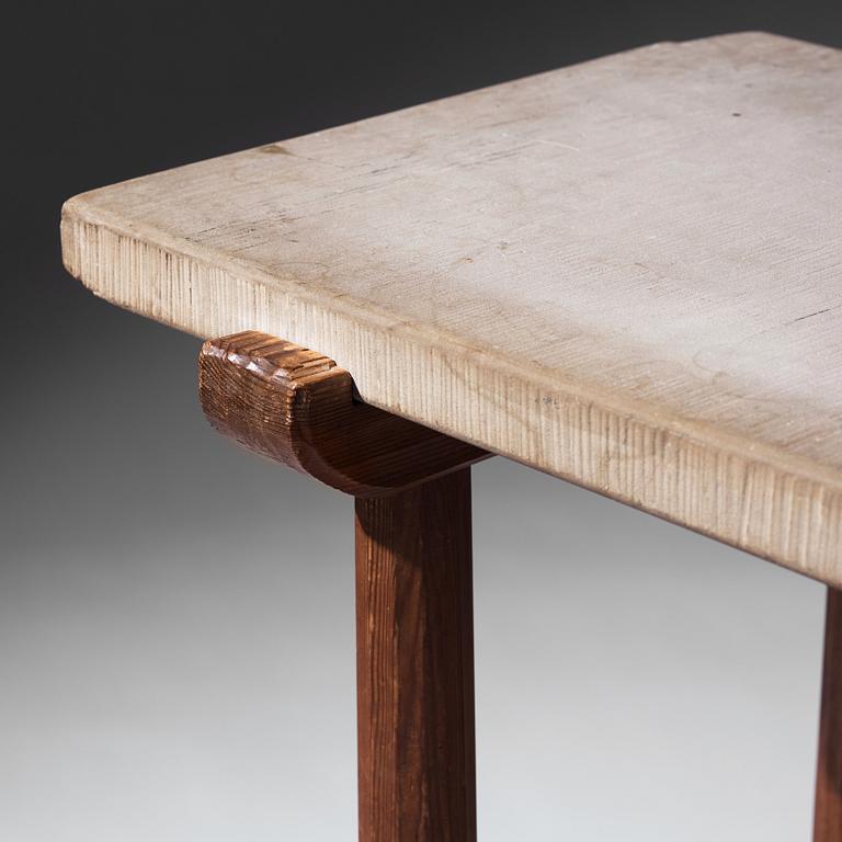 Axel Einar Hjorth, a stained pine and limestone top "Sandhamn" table, Nordiska Kompaniet, Sweden 1931.