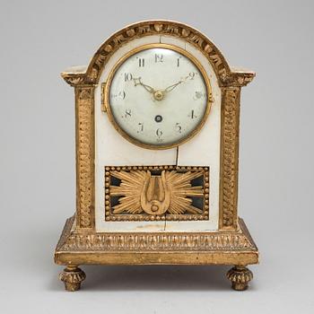 A Swedish late gustavian table clock, ca 1800.