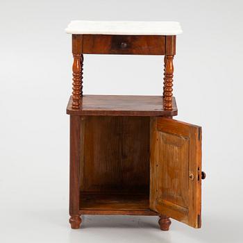 An early 20th century bedside table.