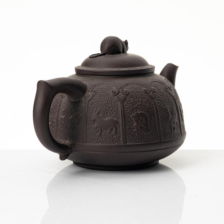 Bao Zhenglan, A brown yixing 'zodiac' teapot, China, 1990s.