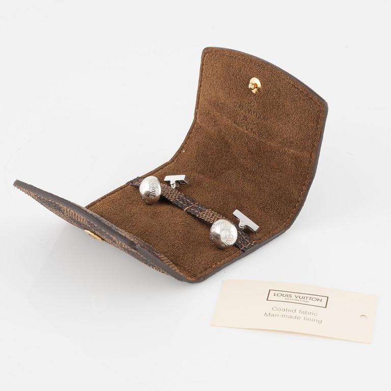 Louis Vuitton, a pair of cufflinks in a damier ebene case.