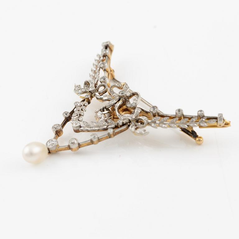 Brooch, gold and platinum, in the form of a bow and garlands with diamonds and a pearl.