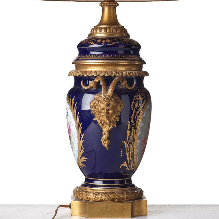 A French bronze mounted porcelain table lamp, late 19th Century, signed Thuilier.