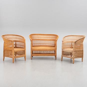 A rattan sofa and a pair of armchairs, second half of the 20th century.