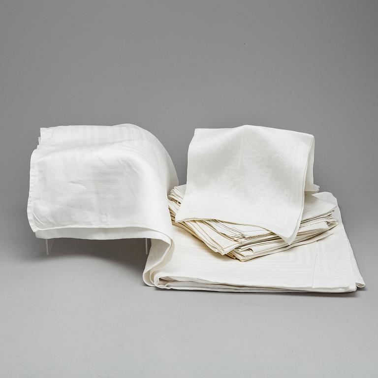 24 pieces of linen napkins and a table cloth.