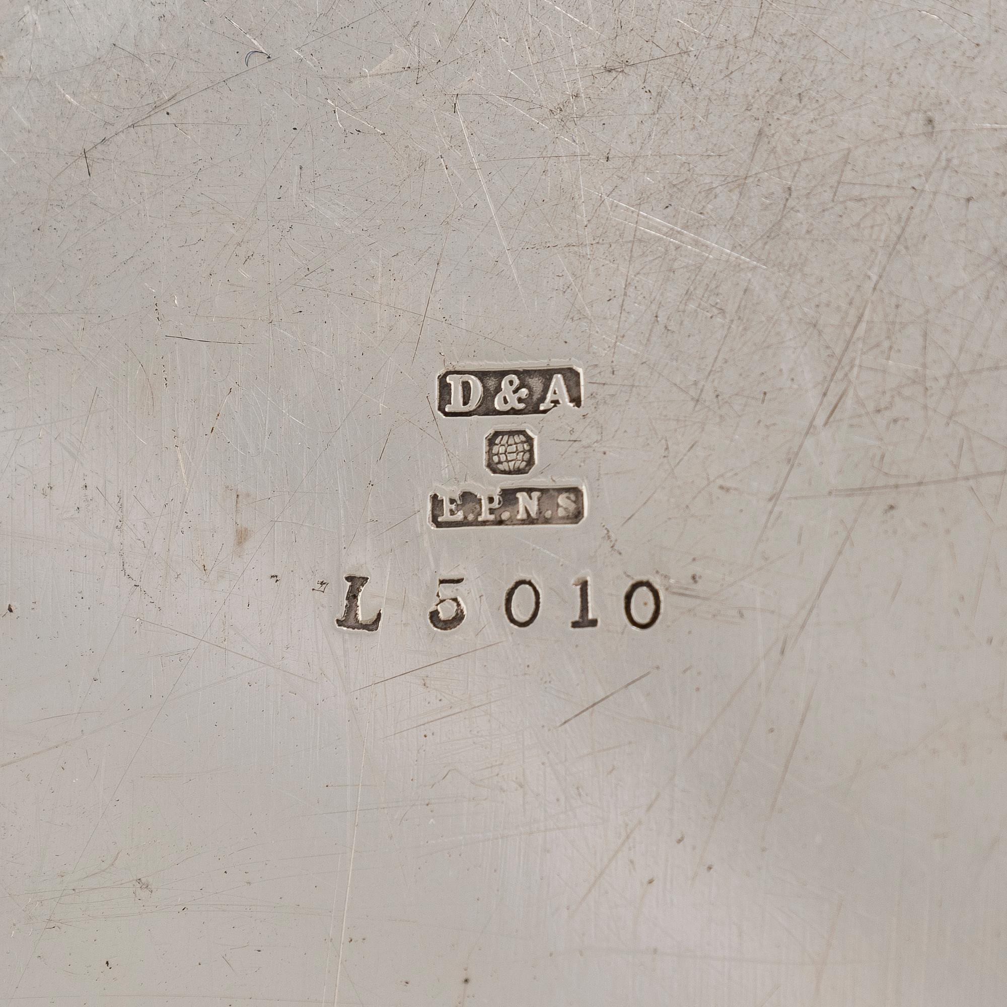 A set of four silver plated entree dishes, England.