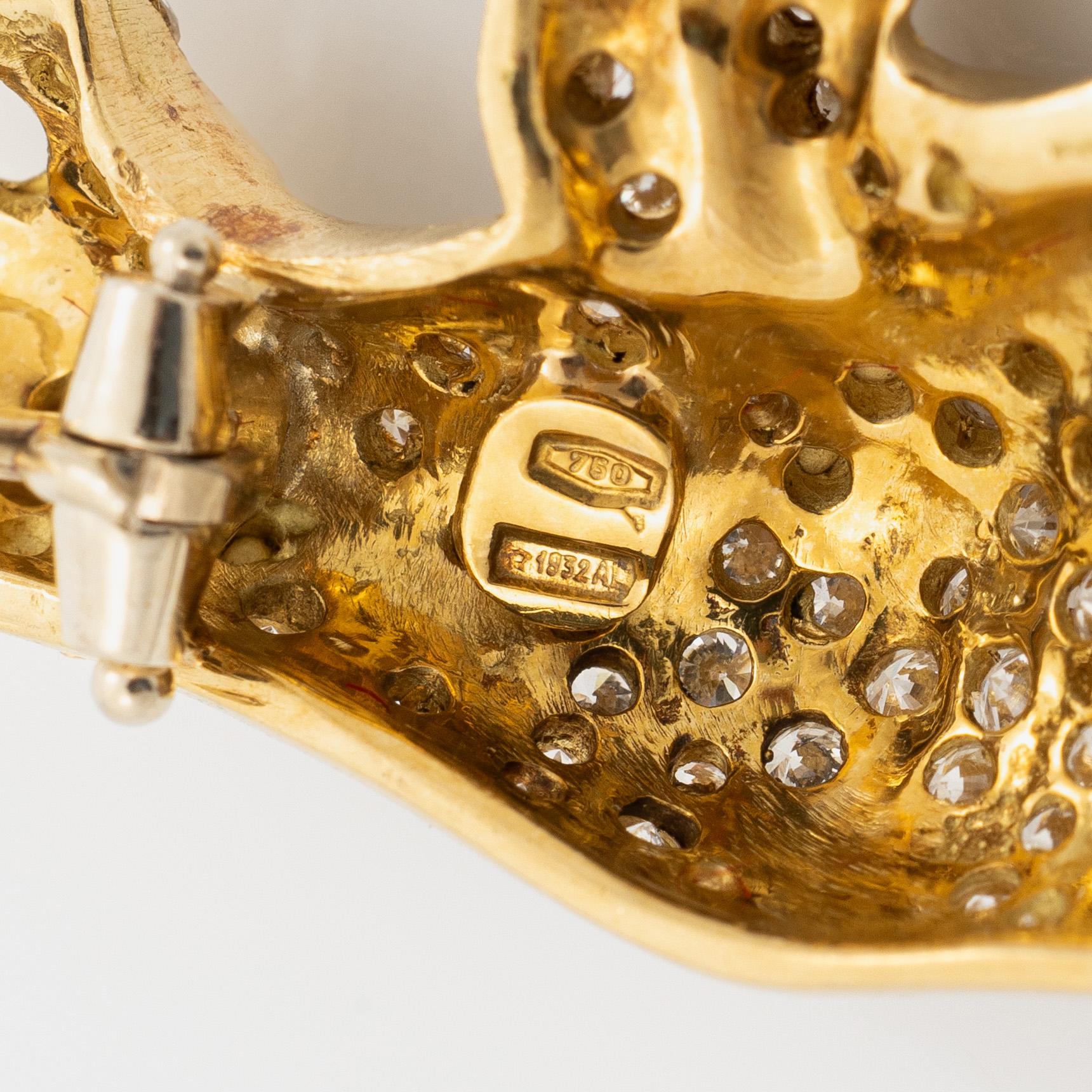 Panther brooch, 18K gold with brilliant-cut diamonds and enamel.