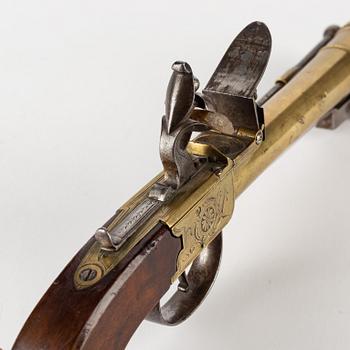 A Wallis brass blunderbuss flintlock pistol, early 19th Century.