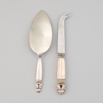 A silver sandwish spade and a silver and stainless steal cheese knife, "Konge/Acorn" from Georg Jensen.