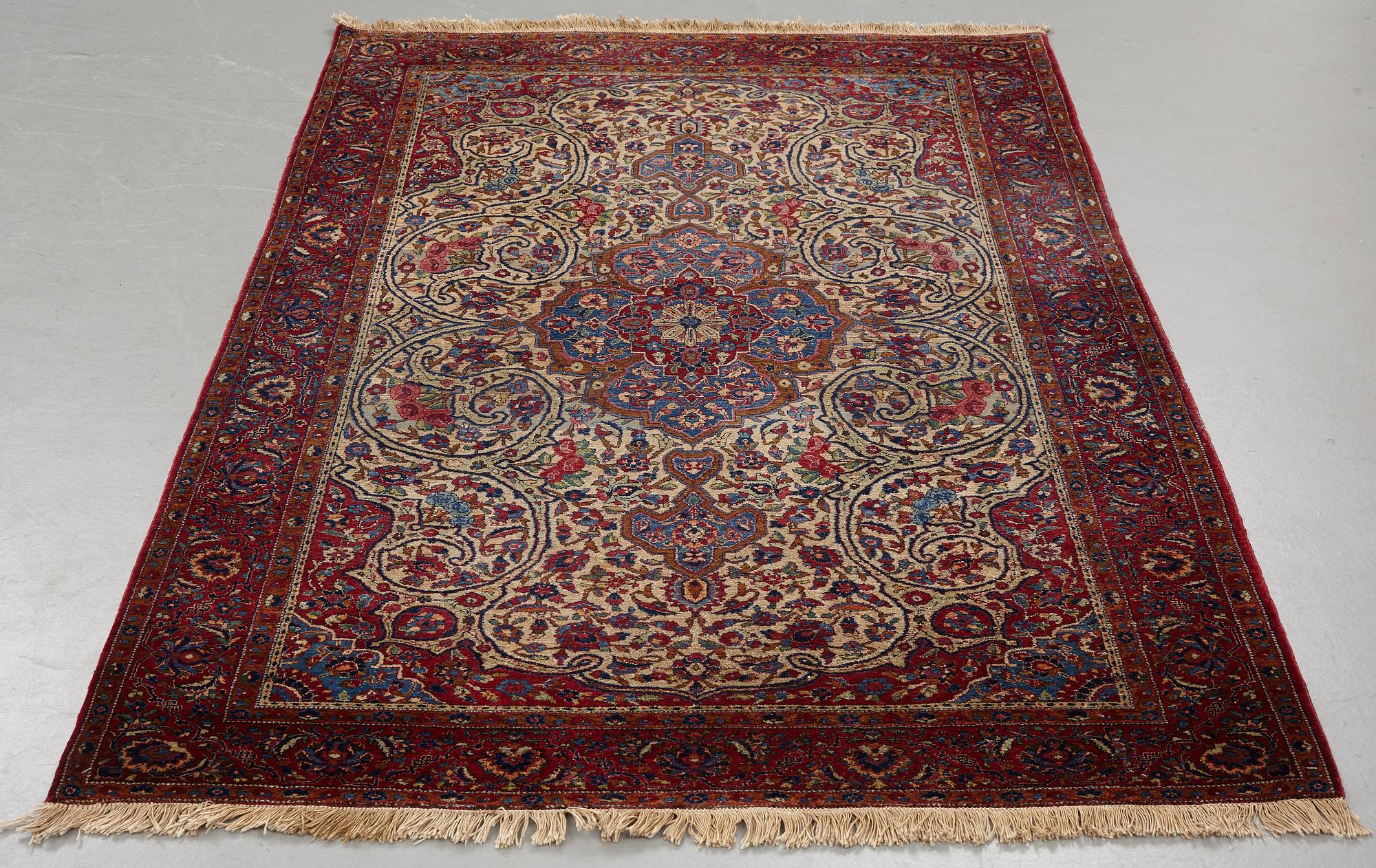 Matto, a semi-antique silk Kashan, ca 212,5-214,5 x 134,5-135,5 cm.